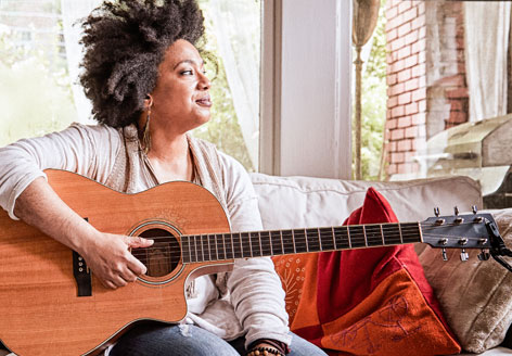 women with guitar image